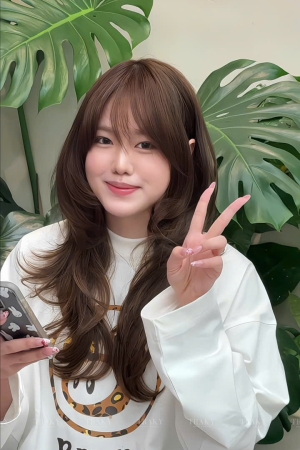 Shoulder-length perm in District 7, naturally beautiful, Korean standard at Traky Hair Salon